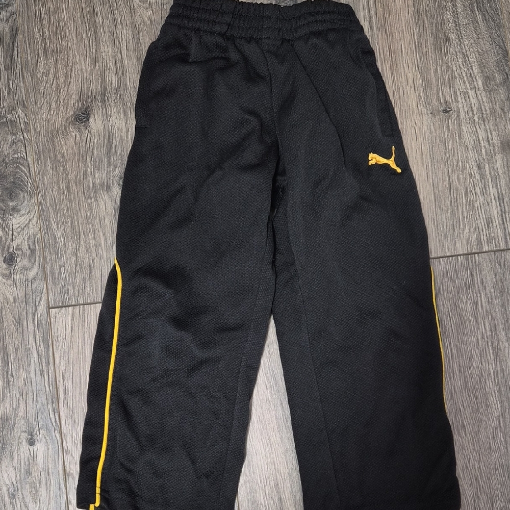 Puma Kids Black Sweatpants with Yellow Accents